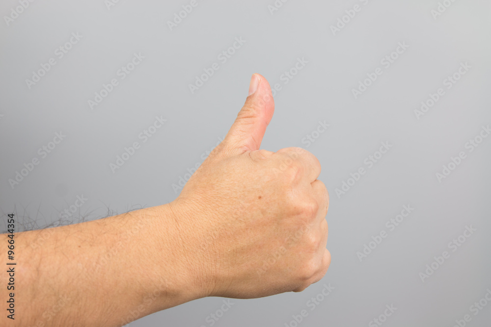 Man hand sign isolated on gray background Man hand sign isolated on gray background