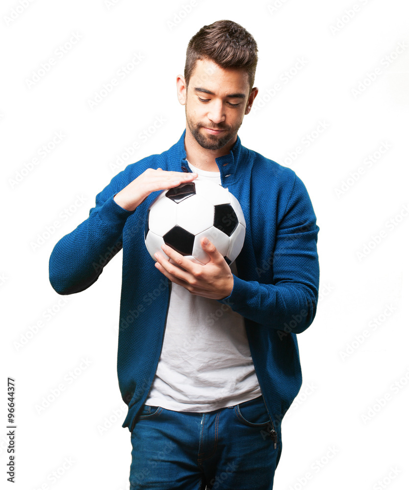 young man holding a soccer ball