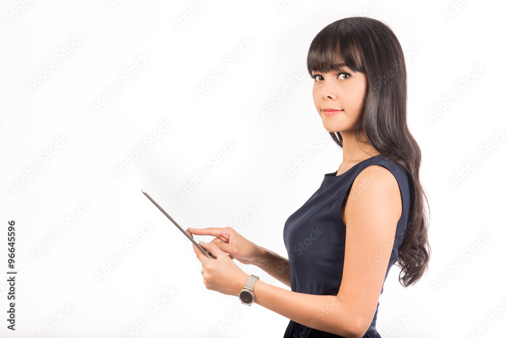 Beautiful business woman using a digital tablet computer isolated on white with clipping path Beautiful business woman using a digital tablet computer isolated on white with clipping path
