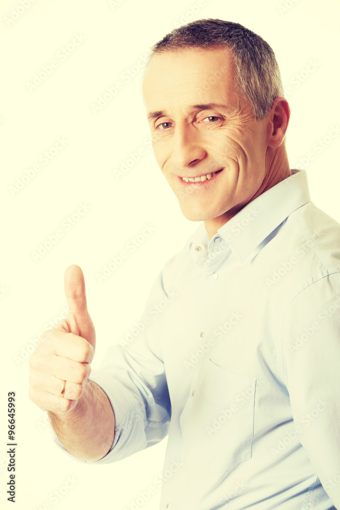 Mature man gesturing ok sign Mature man gesturing ok sign