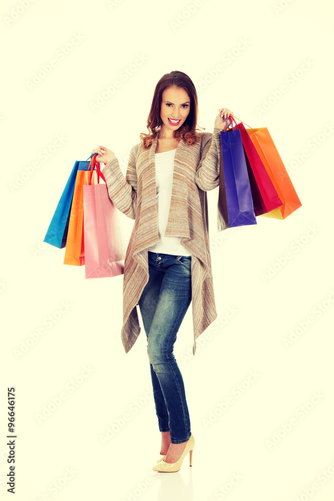 Happy woman with shopping bags.