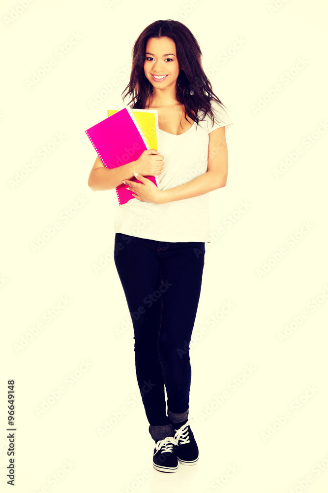 Young student woman with notes. Young student woman with notes.