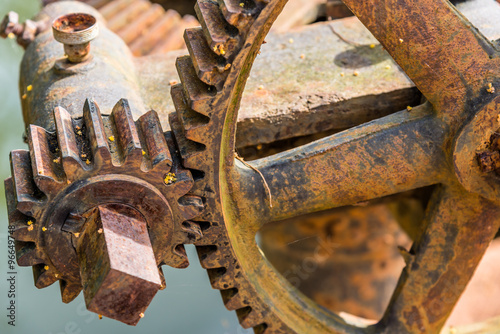 Old rusty and dirty steel gear closeup