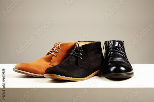 a lot of men's shoes.fashion still life men boots