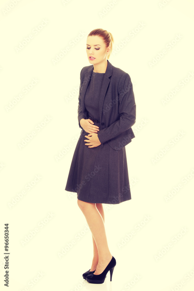 Businesswoman with stomach ache. Businesswoman with stomach ache.