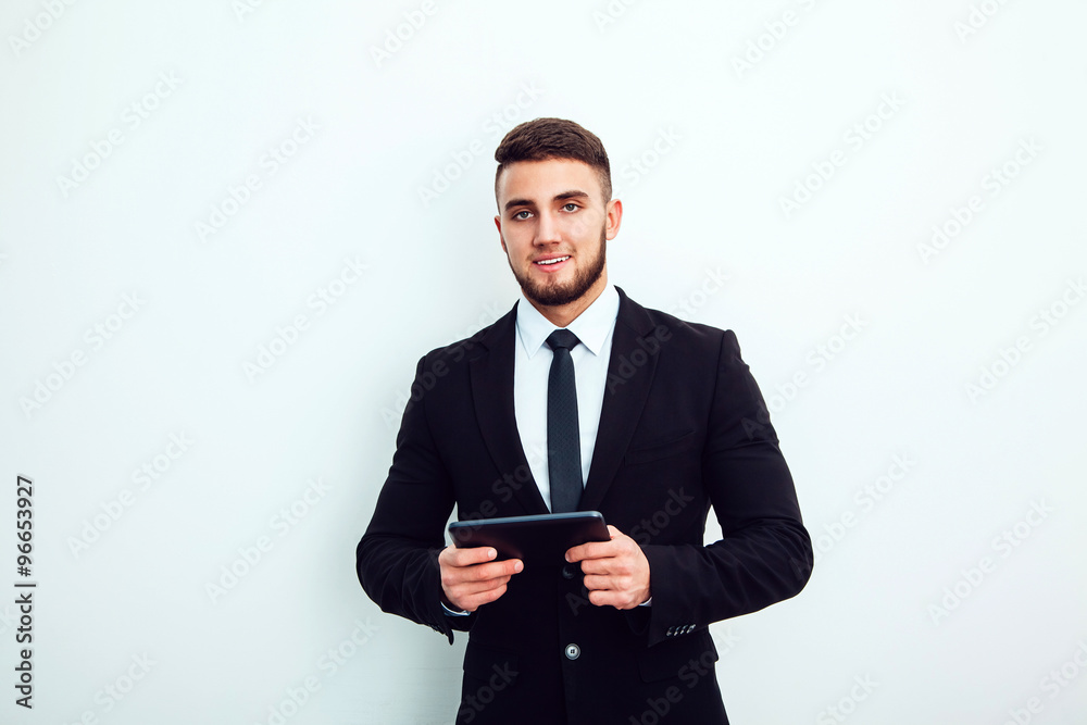 Portrait of an handsome businessman with a tablet Portrait of an handsome businessman with a tablet