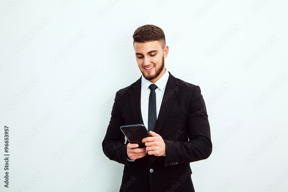 Portrait of an handsome businessman with a tablet Portrait of an handsome businessman with a tablet