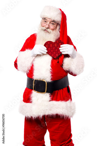 Father santa showing a heart