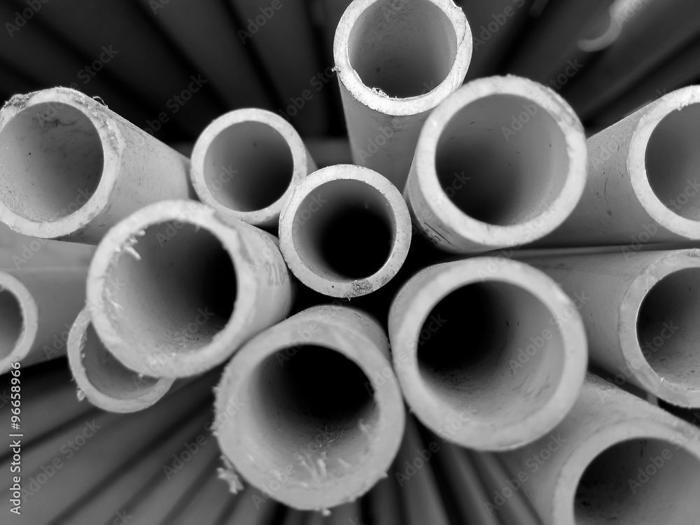 Soft focus background of plastic pipes in black and white. Soft focus background of plastic pipes in black and white.