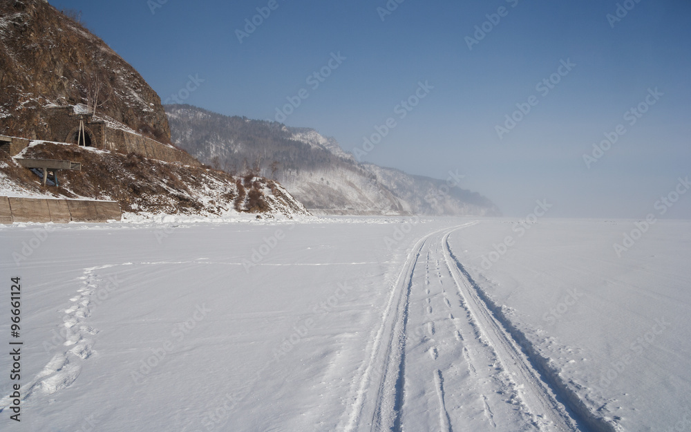 Winter road along the lake Baikal Winter road along the lake Baikal