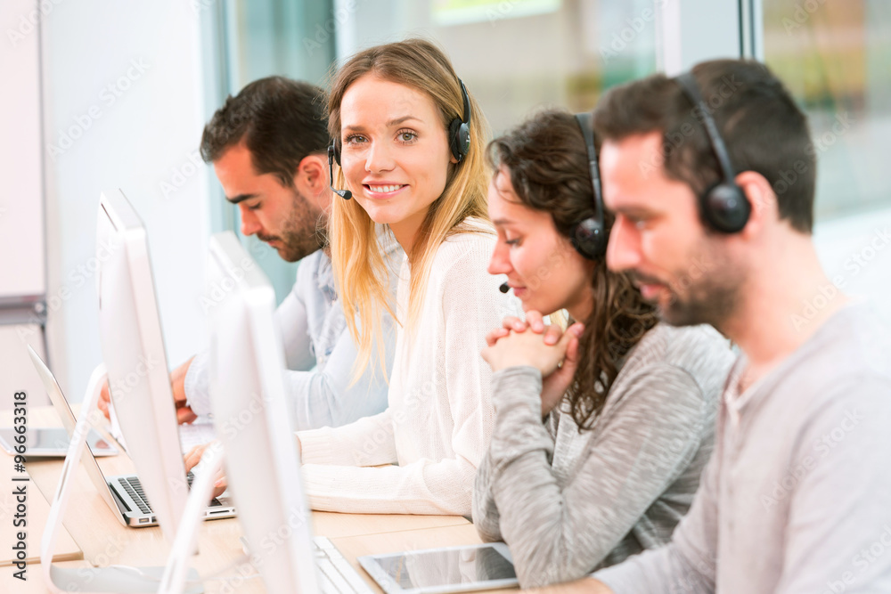 Young attractive woman working in a call center Young attractive woman working in a call center