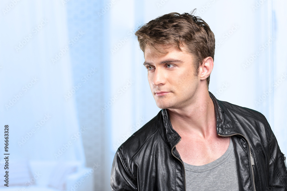 Fototapeta premium Portrait of handsome young thoughtful man