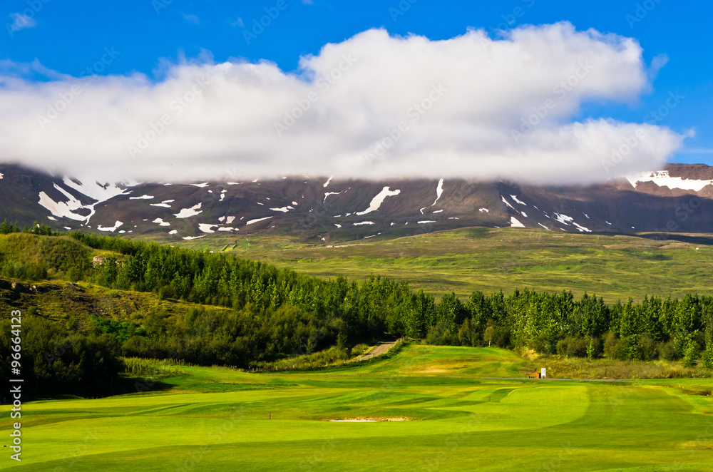 Sunny summer day at golf course at Akureyri, north Iceland