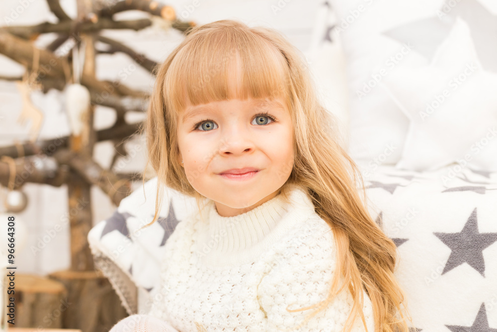 Little girl in christmas decorations Little girl in christmas decorations