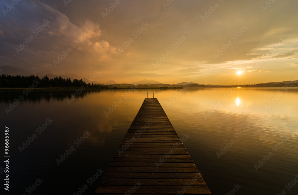 Sunset at the beautifull Lake Hopfensee in Germany.