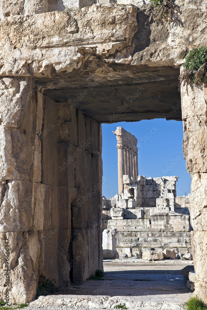 Naklejka premium Baalbek ruins - columns seen in the ancient window