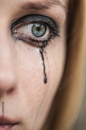woman cries, close-up