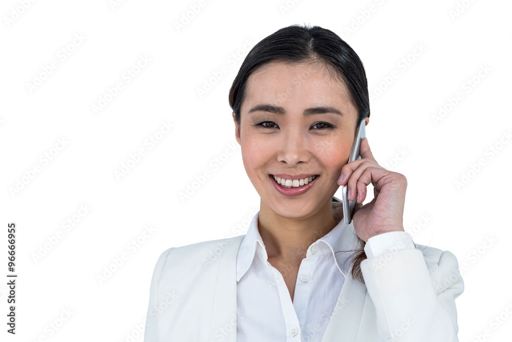 Smiling businesswoman using her phone Smiling businesswoman using her phone