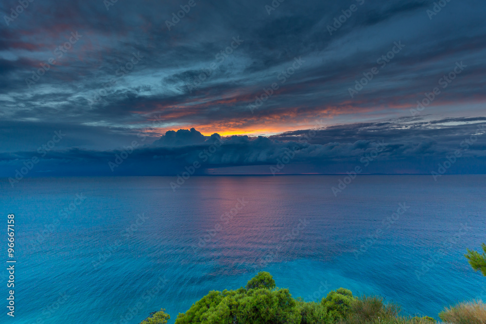 Beautiful sunset in Greece, Lefkada / Sunset at famous Egremni beach at Lefkada, Greece