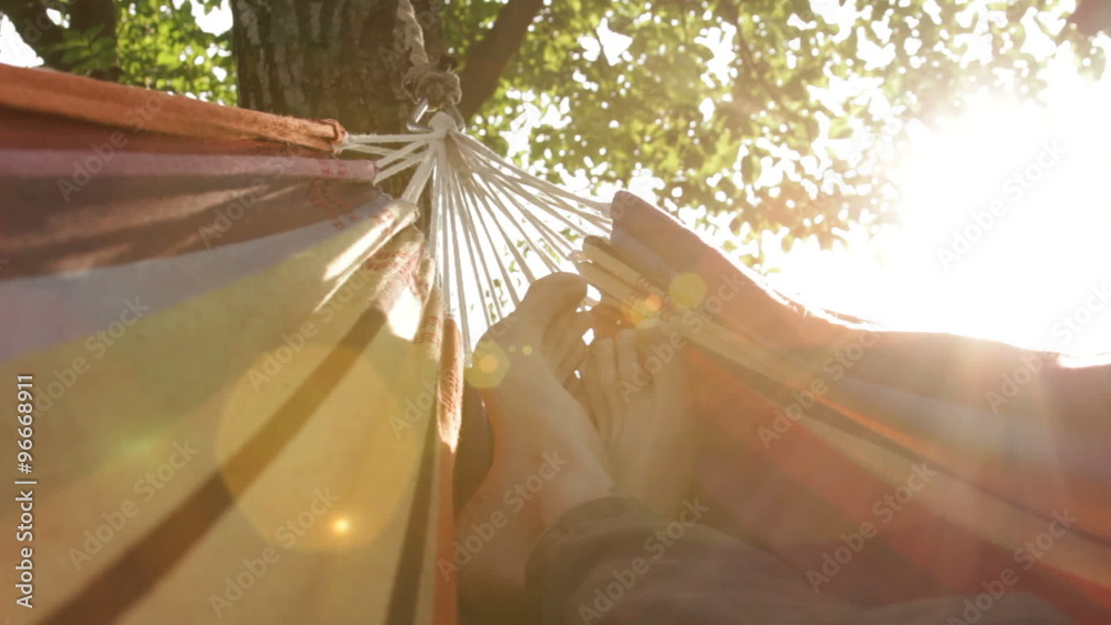 Relaxing in hammock / point of view shot