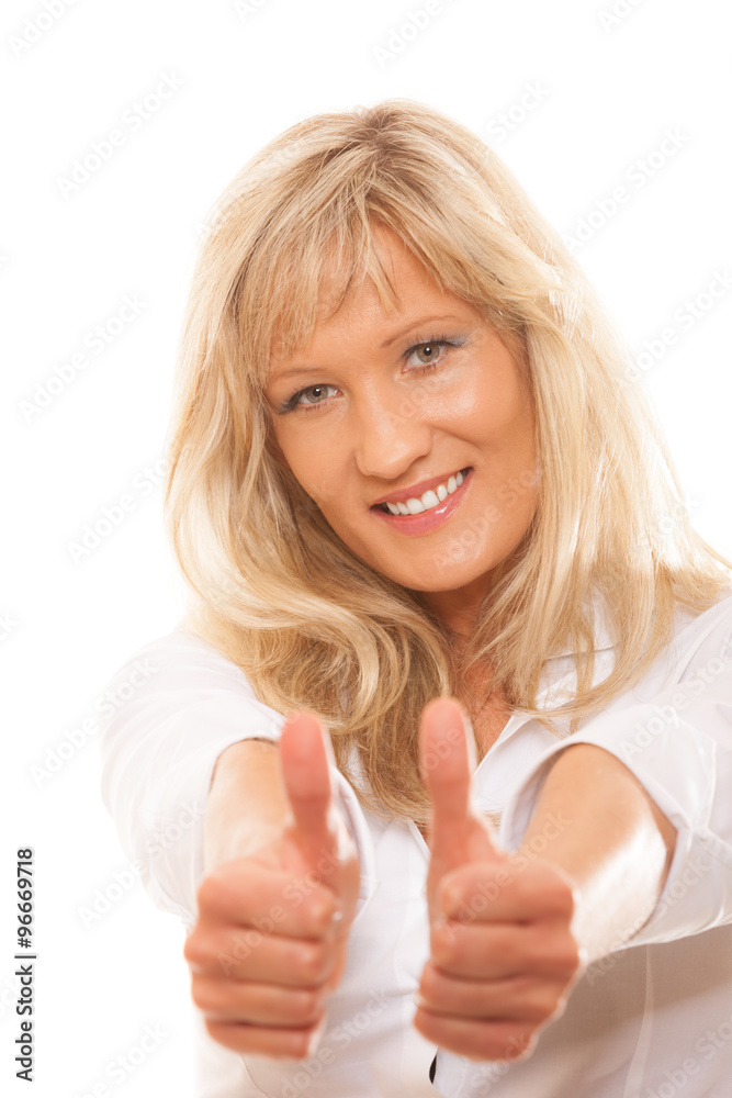 Mature woman giving thumbs up sign isolated Mature woman giving thumbs up sign isolated