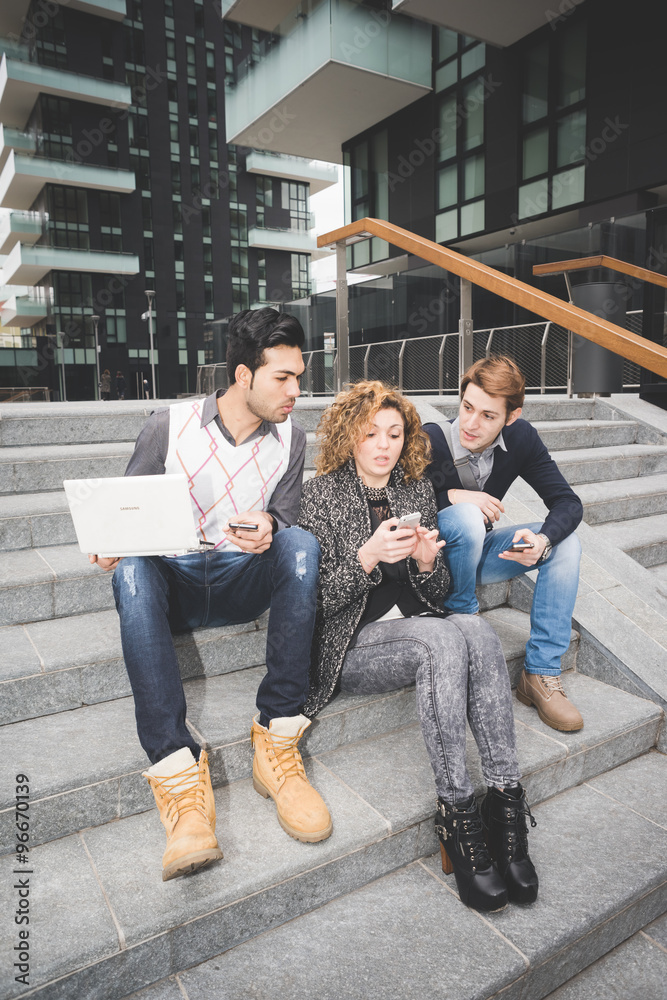 Fototapeta premium Multiracial business people working outdoor in town