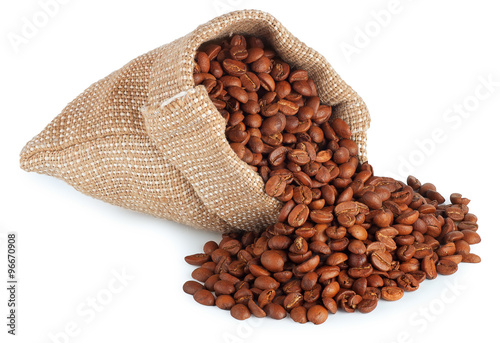 scattered coffee beans in burlap bag isolate