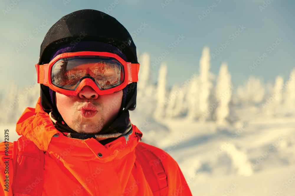 Portrait of young man against a background of the winter sky Portrait of young man against a background of the winter sky