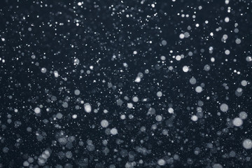 Snow Falling from Night Sky