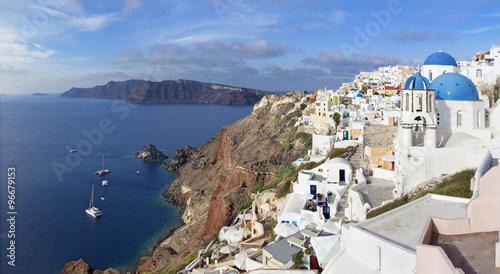 Santorini - The Oia panorama and the Therasia island in the background.