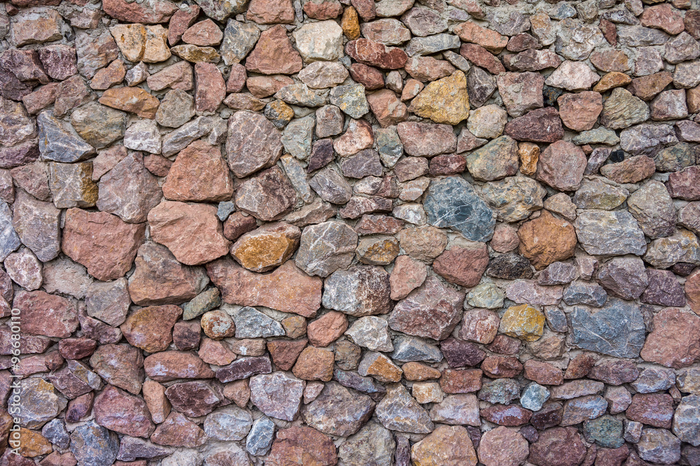 Natural rocks wall. It is used for background and texture.