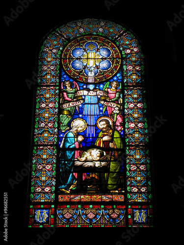 Nativity scene. Stained glass window in the Basilica of the Monastery Montserrat, located in the mountains 56 km from Barcelona, Catalonia, Spain. 