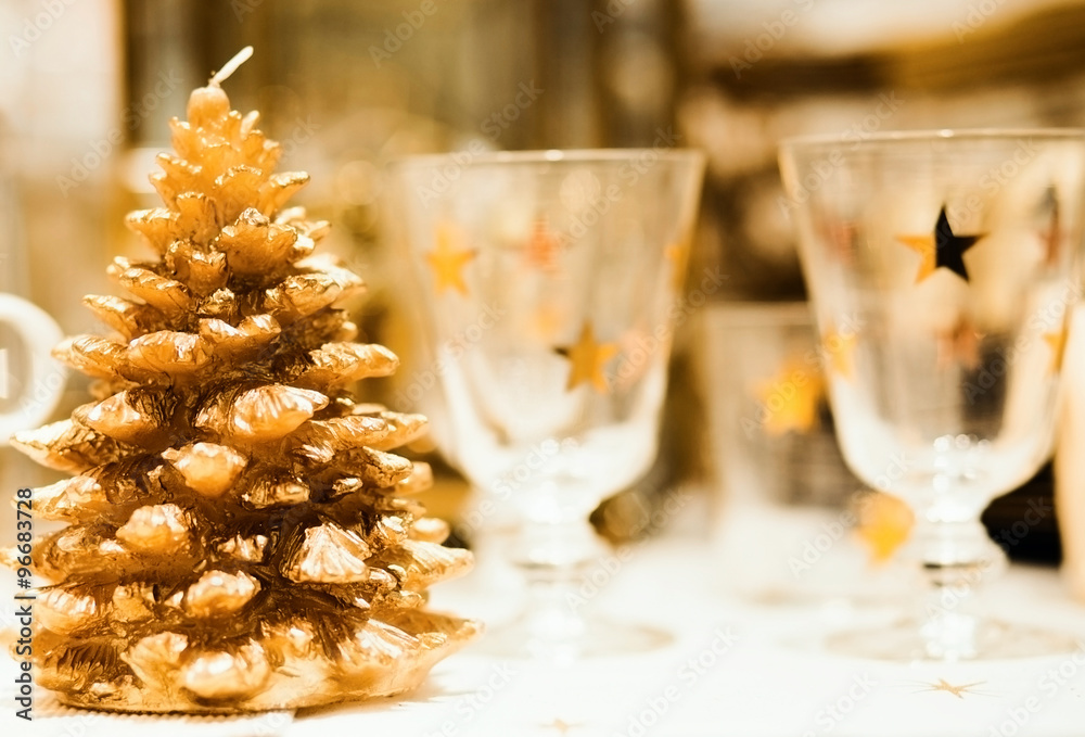  Christmastime table setting with golden festive decorations