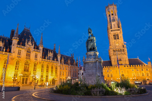 Brugge - Grote markt in evening dusk. Belfort van Brugge and Provinciaal Hof buildings