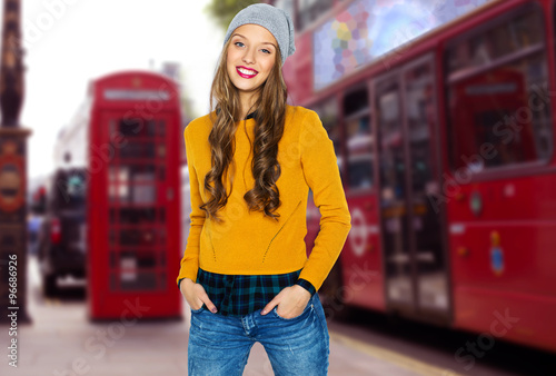 Canvas Print happy young woman or teen over london city street