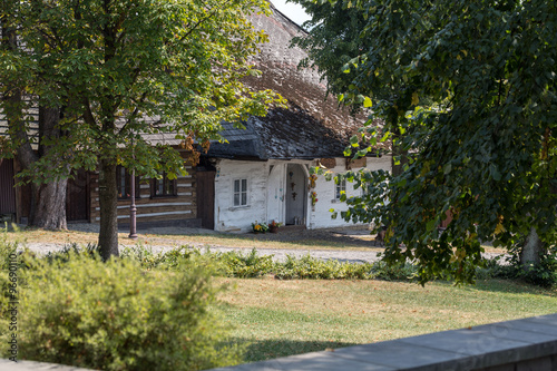 Old wooden white house in Lanckorona in Poland