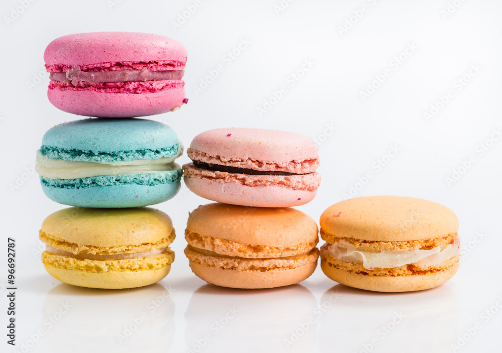 Colorful and tasty French cookies Macarons on white background Colorful and tasty French cookies Macarons on white background