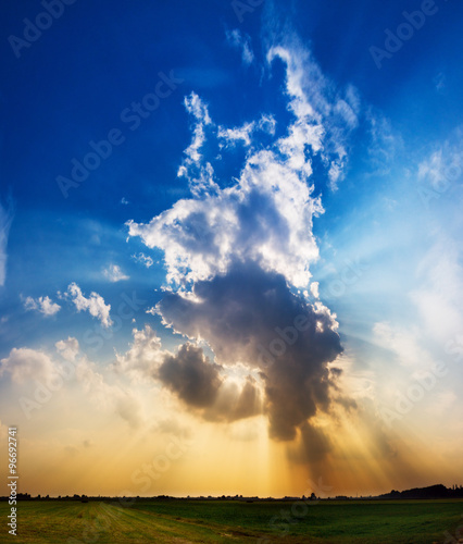 Beautiful cloudscape with dramatic sun ray beams
