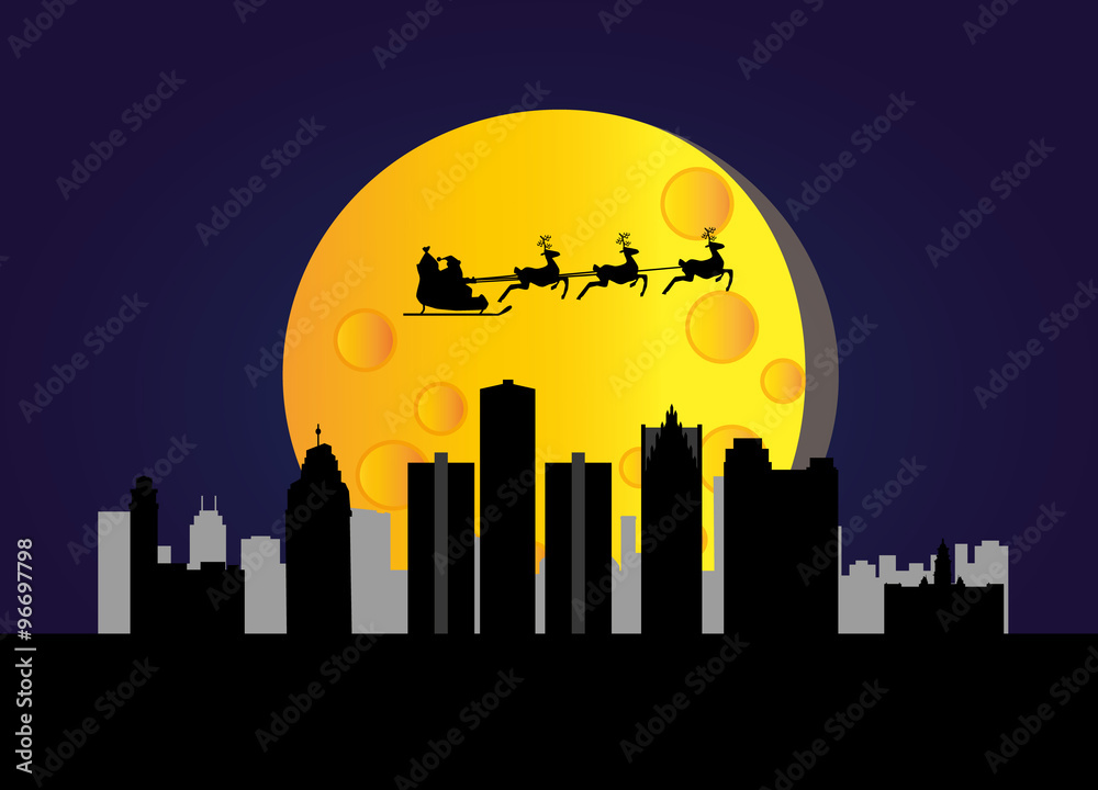 santa flying over the city of detroit