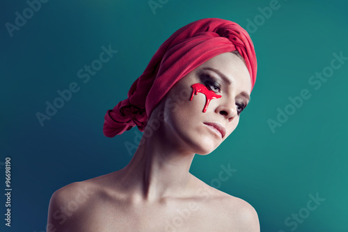 Beauty original woman portrait with red color