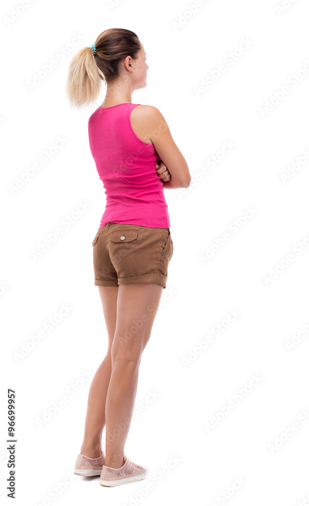 back view of standing young beautiful woman. back view of standing young beautiful woman.