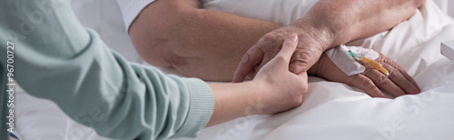 Photos Female holding cancer patient hand