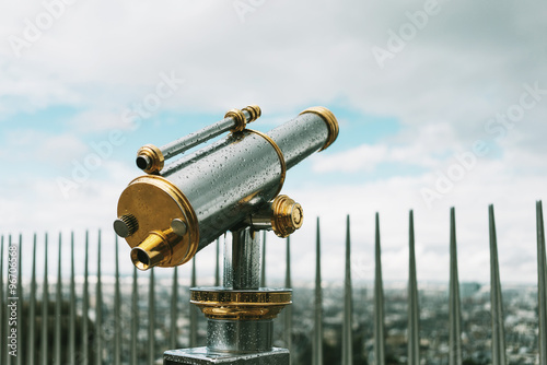 Сoin-operated binoculars overlooking the panorama of the city Paris