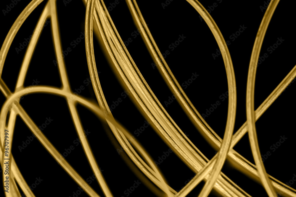 yellow cable on the black background. The inversion yellow cable on the black background. The inversion