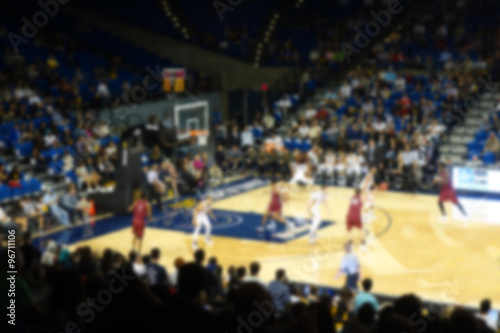blurred background of sports arena crowd