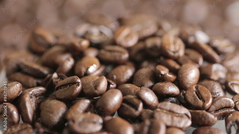 Rotating fresh coffee beans Rotating fresh coffee beans