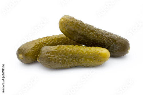 Pickled cucumbers isolated on white background.