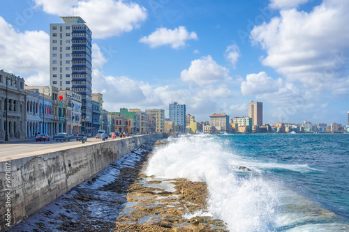 Photography The skyline of Havana with waves crashing on the  seawall