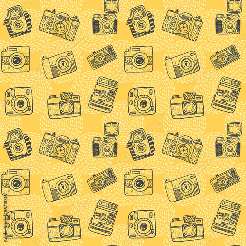 Seamless pattern with hand drawn retro cameras