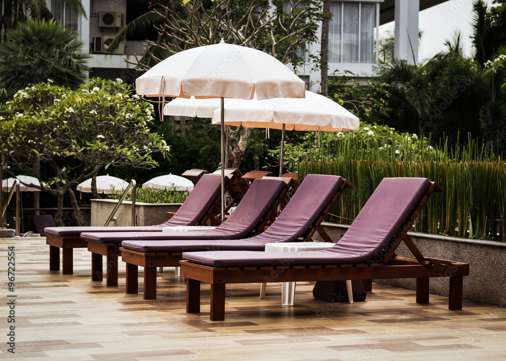 Outdoor couches with umbrellas